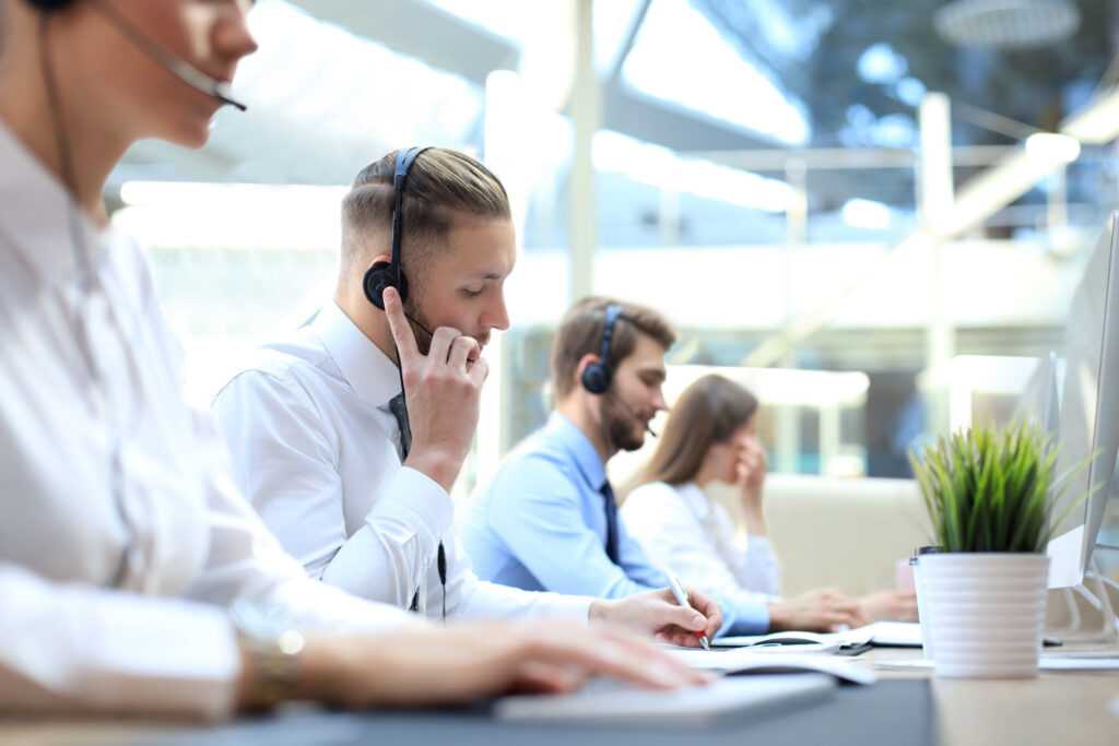 Employees using Business Call Center VoIP Phone System 