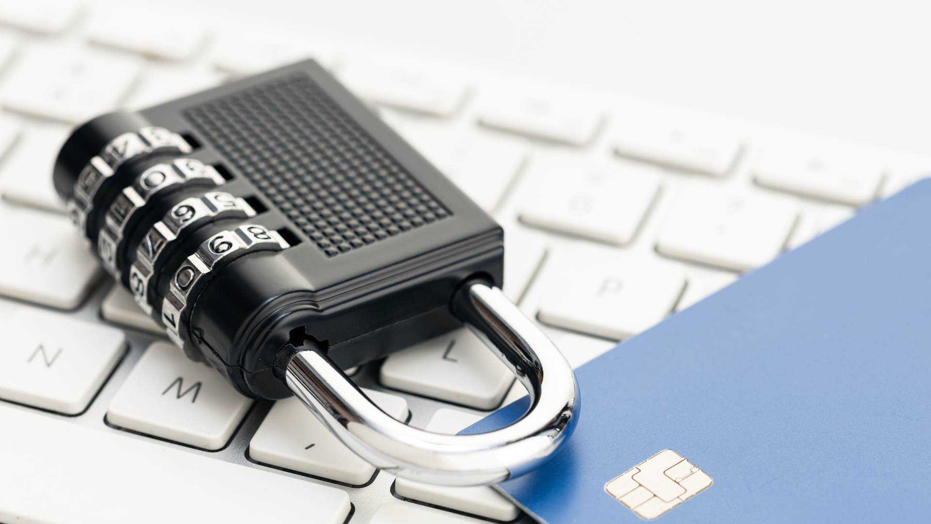 Credit card with padlock on computer