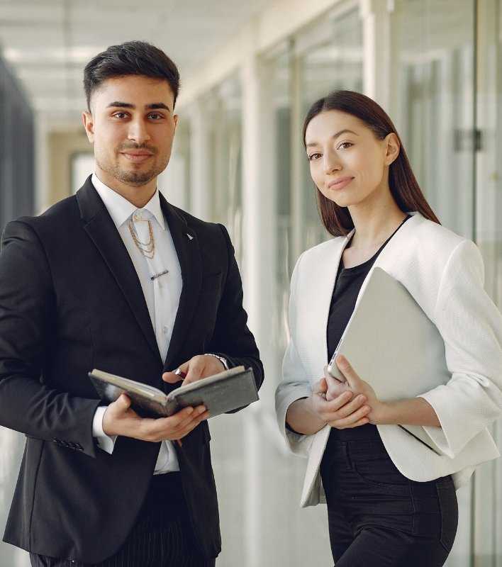 Business Professionals With Notes And Files