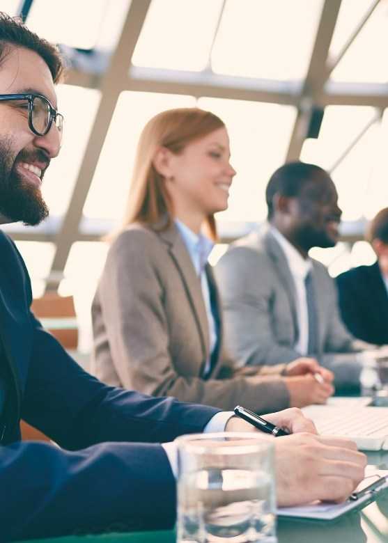 Business Professionals Sitting In Conference