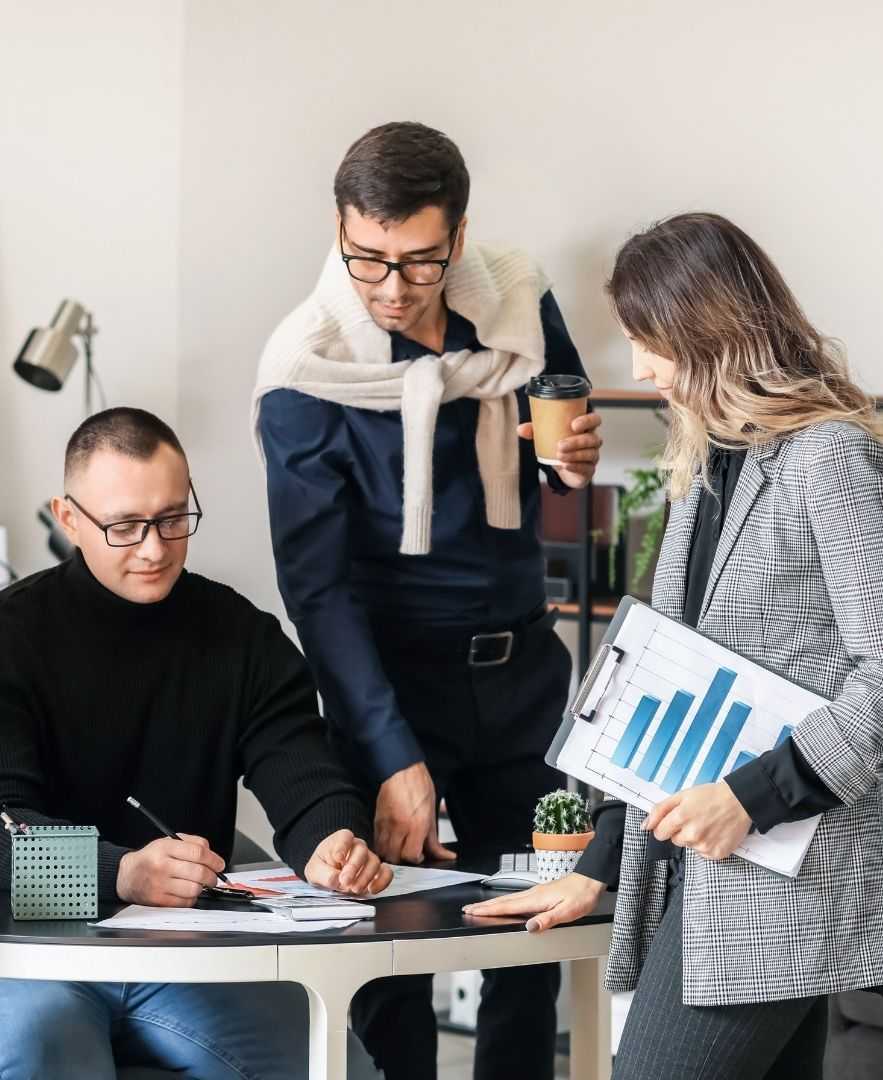 Colleagues Discussing Business in Office