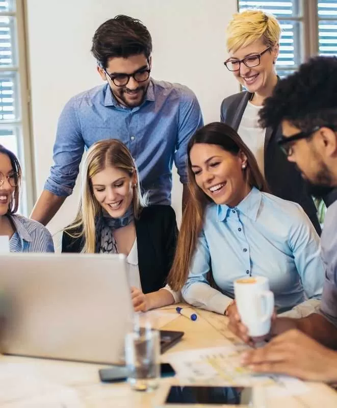 Professionals Collaborating Over a Laptop