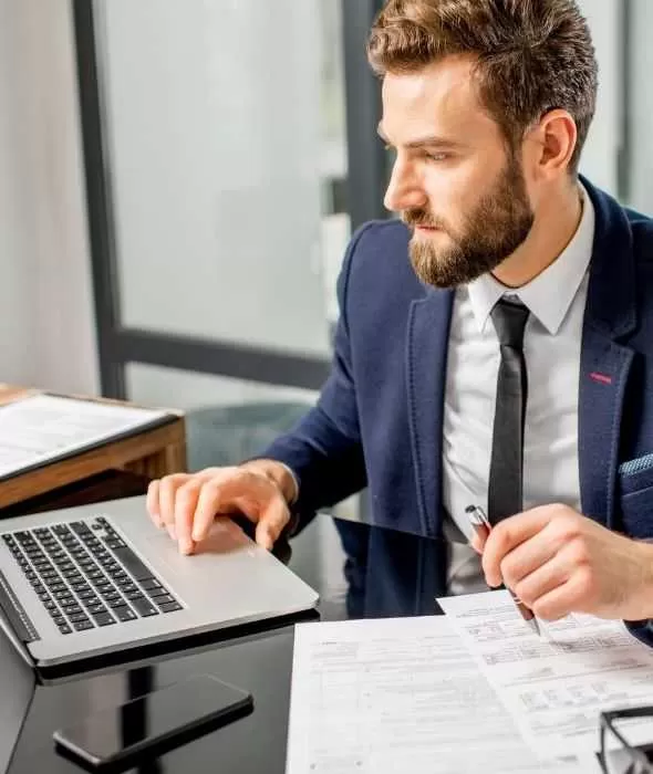 IT Professionals Working On Laptop In Office<br />

