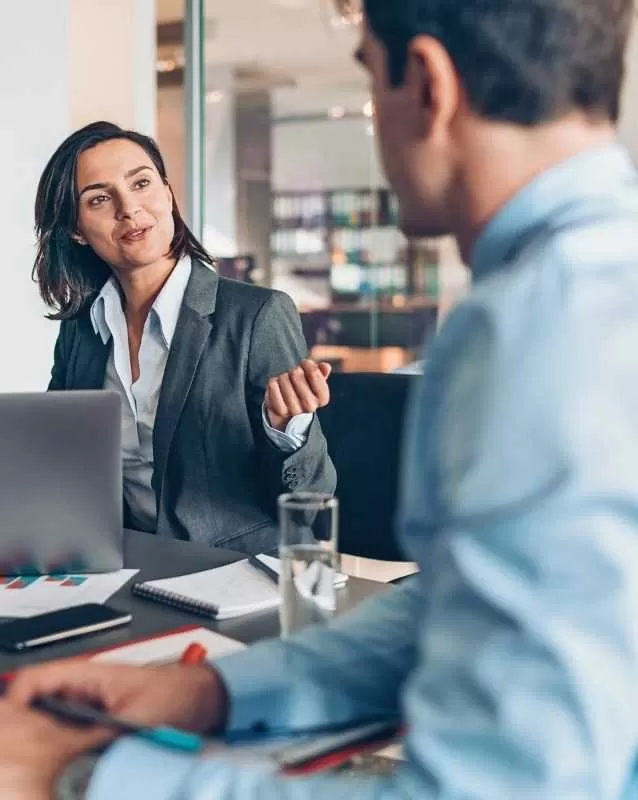 IT Professionals Having Discussion In Office<br />
