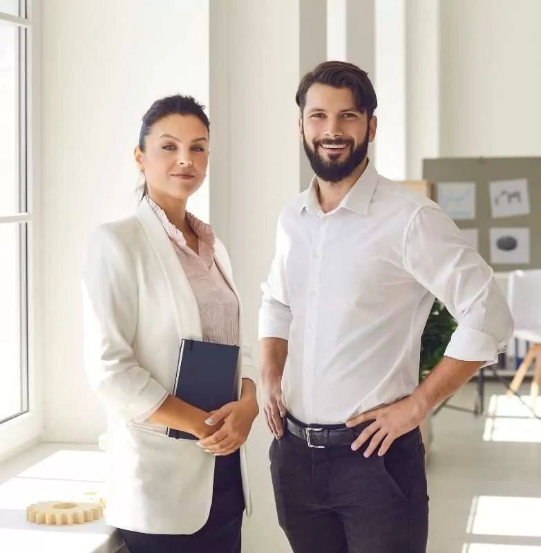 IT Professionals Standing In Modern Office<br />
