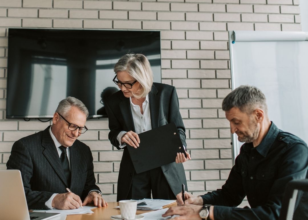 Business Professional Working On Laptops