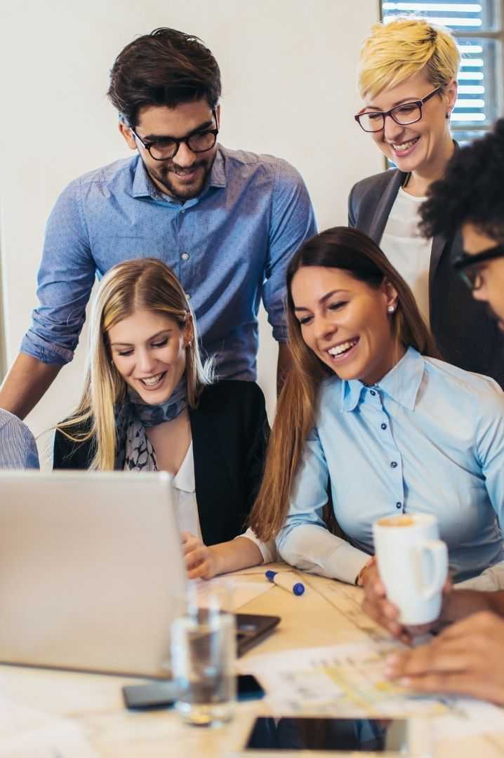  IT Professionals Collaborating At Office 