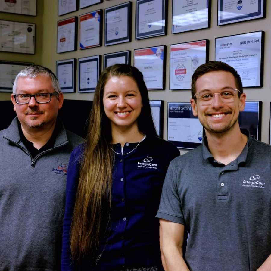 IT Professionals Standing In Modern Office<br />
