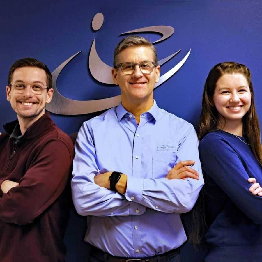 Man in Suit Reviewing Documents