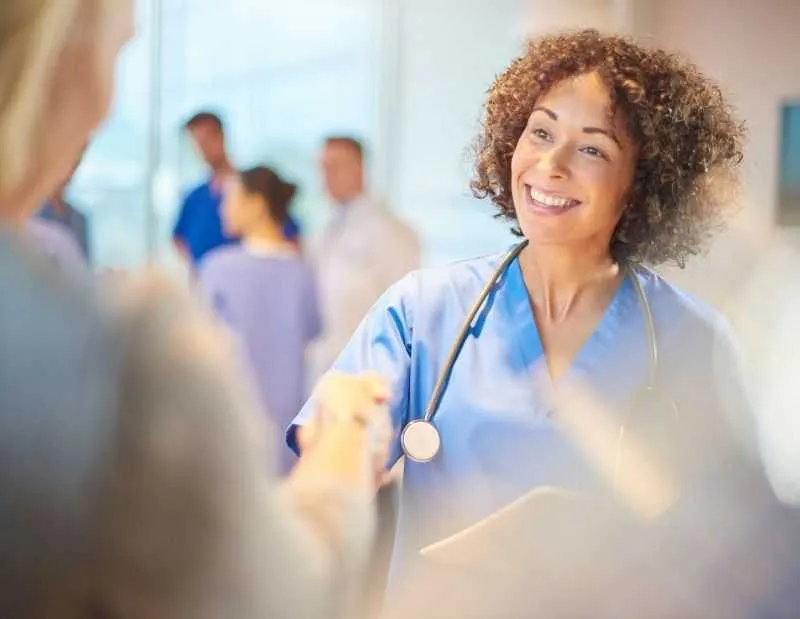 Healthcare Professional Greeting Patient<br />
