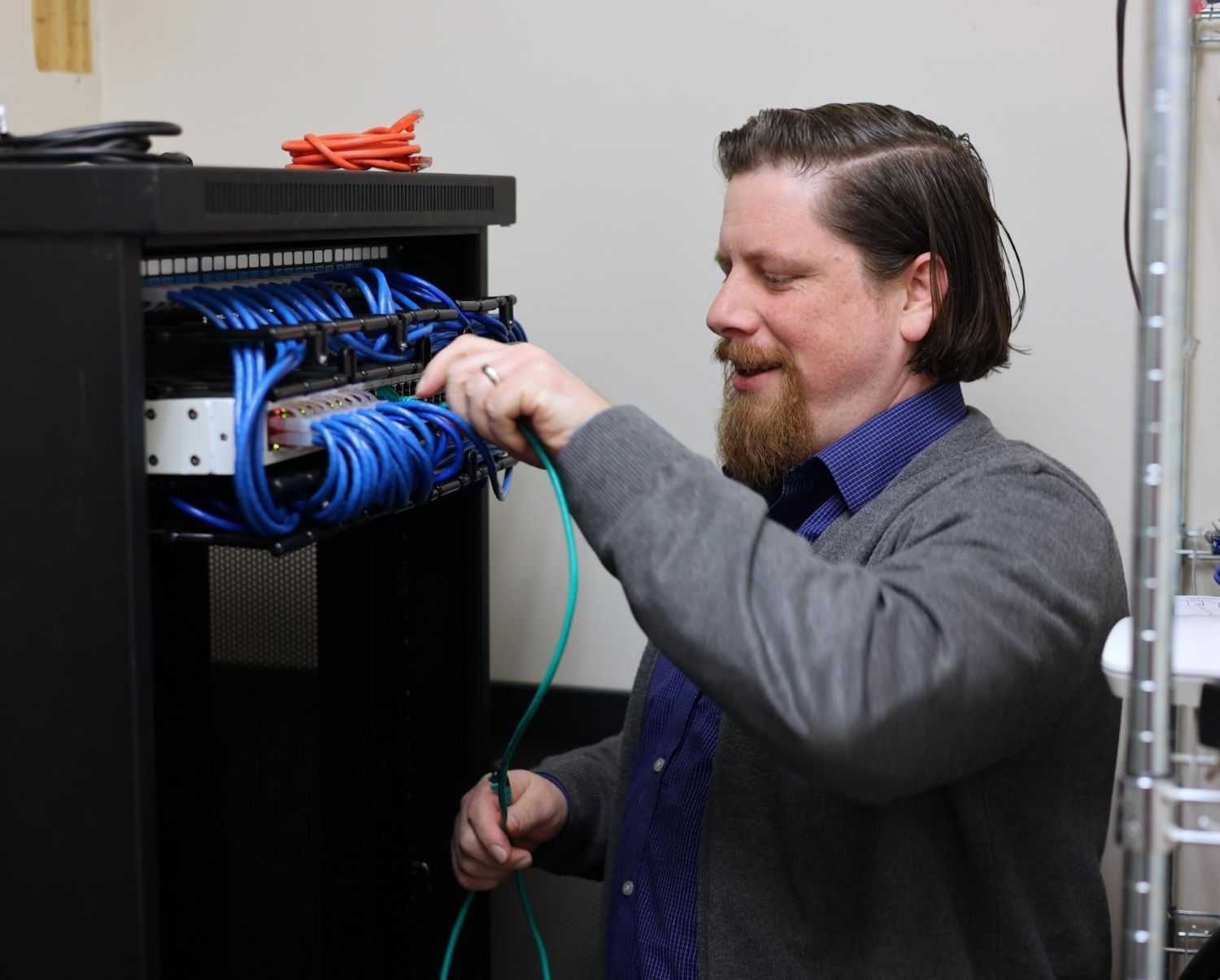  Business Professionals Reviewing Documents Together 