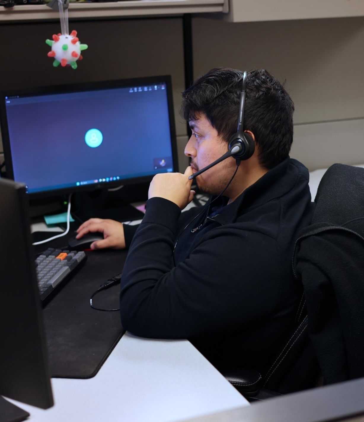  Woman Working On Laptop With Headset 