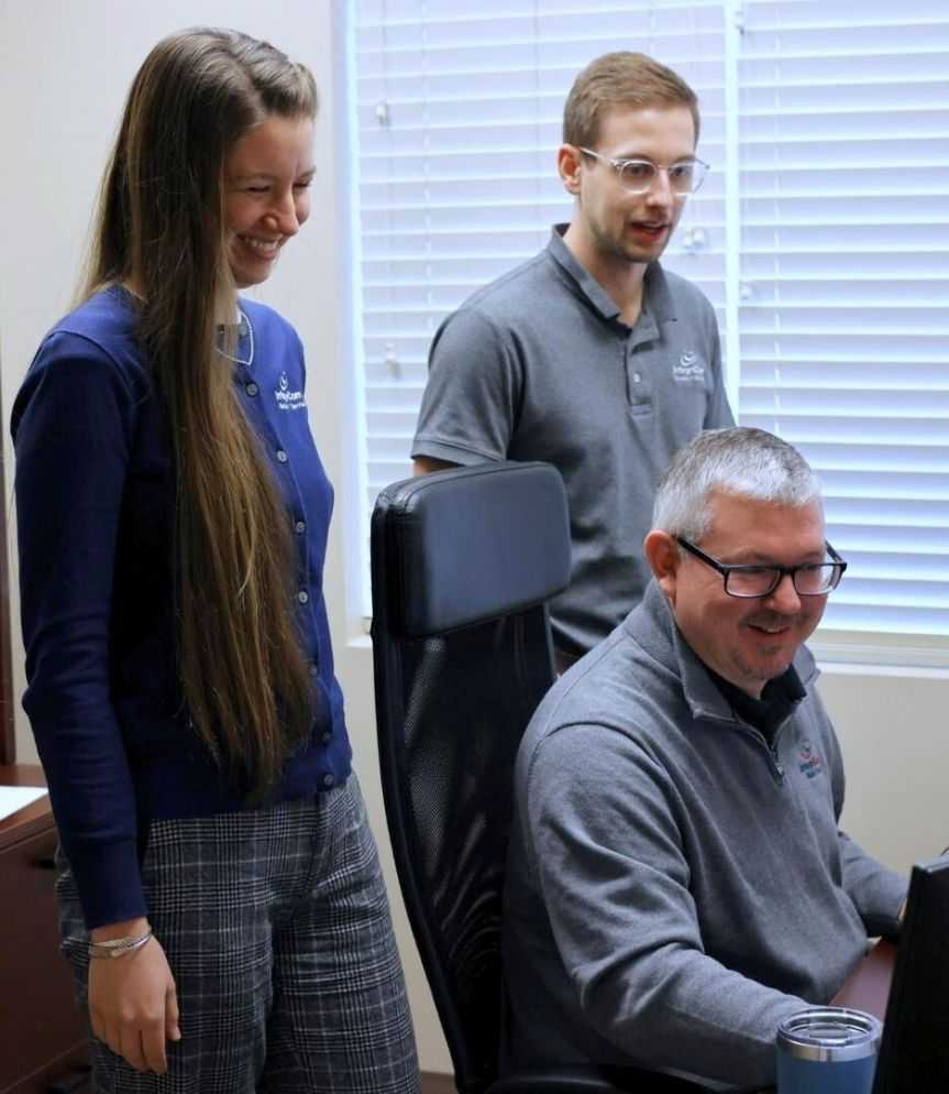 Business Professionals With Notes And Files