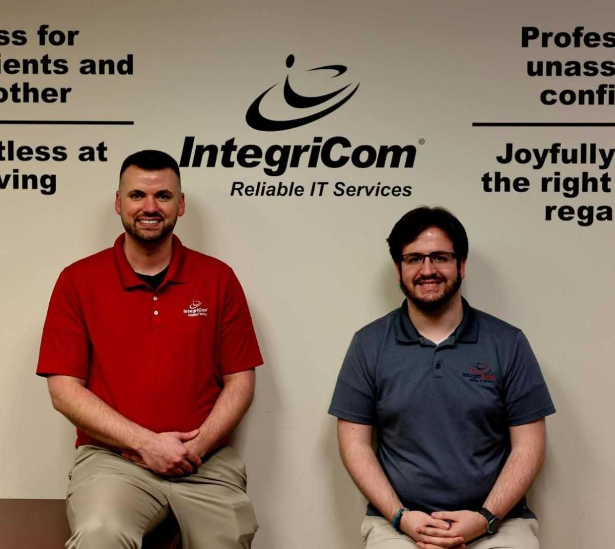 Business Professionals Discussing With Tablet