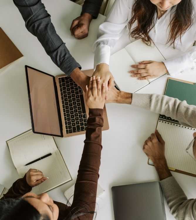 Business Team Meeting Around Office Table