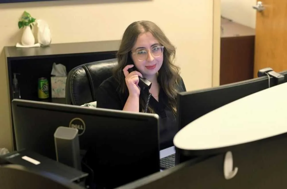 IT Support Specialist Assisting Client